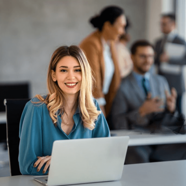 women sitting in front of laptop